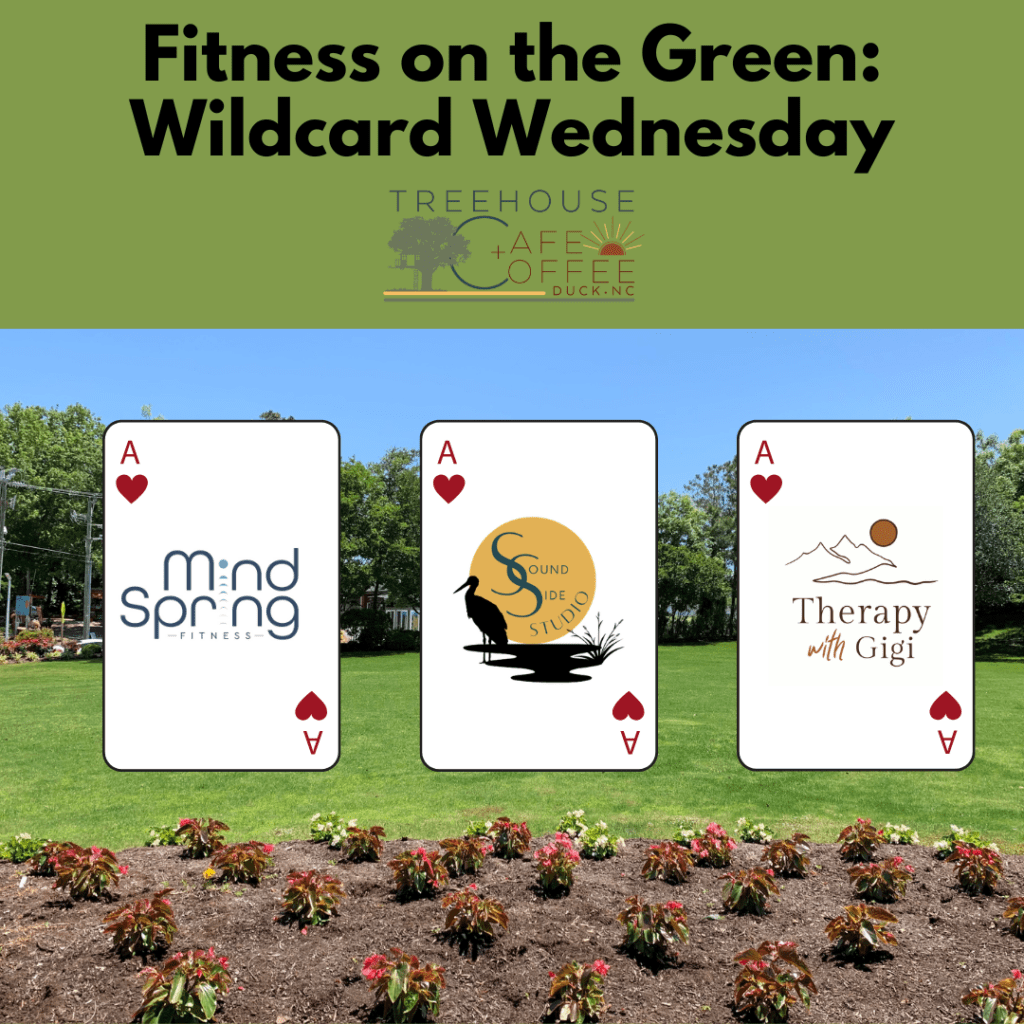 Playing cards with business logos on them set in front of an empty lawn
